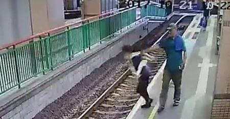 Man arrested in Hong Kong for calmly shoving cleaner onto rail track