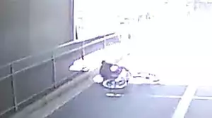 Dashcam shows car knock man off bike