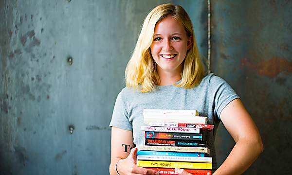 This Woman Reads 100 Books In A Month (And How You Can Too)