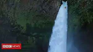 'Extreme kayaker' plunges down waterfall
