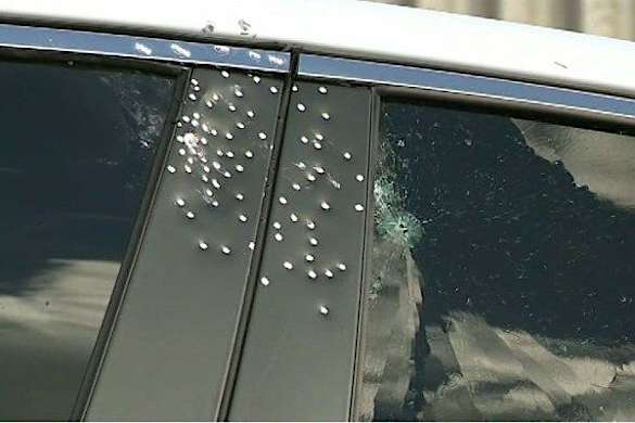 Woman's car sprayed with bullets on interstate