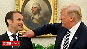 Trump brushes dandruff off 'perfect' Macron