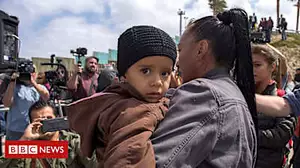 Caravan migrants cross US border