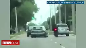 Florida driver swerves to hit motorcyclist