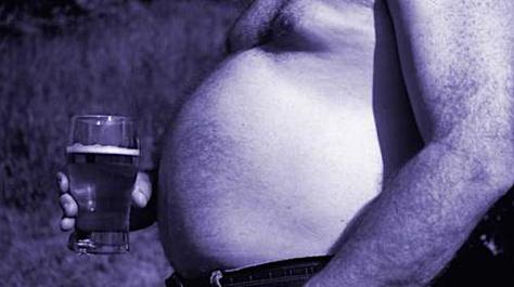 What causes a beer belly?