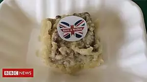 Royal wedding marked by battered cake