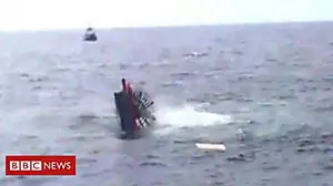 Moment paddle steamer sinks into sea