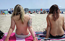 Topless beachgoers: Ban is unconstitutional, discriminatory